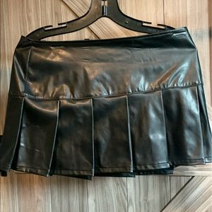 black vegan leather mini skirt